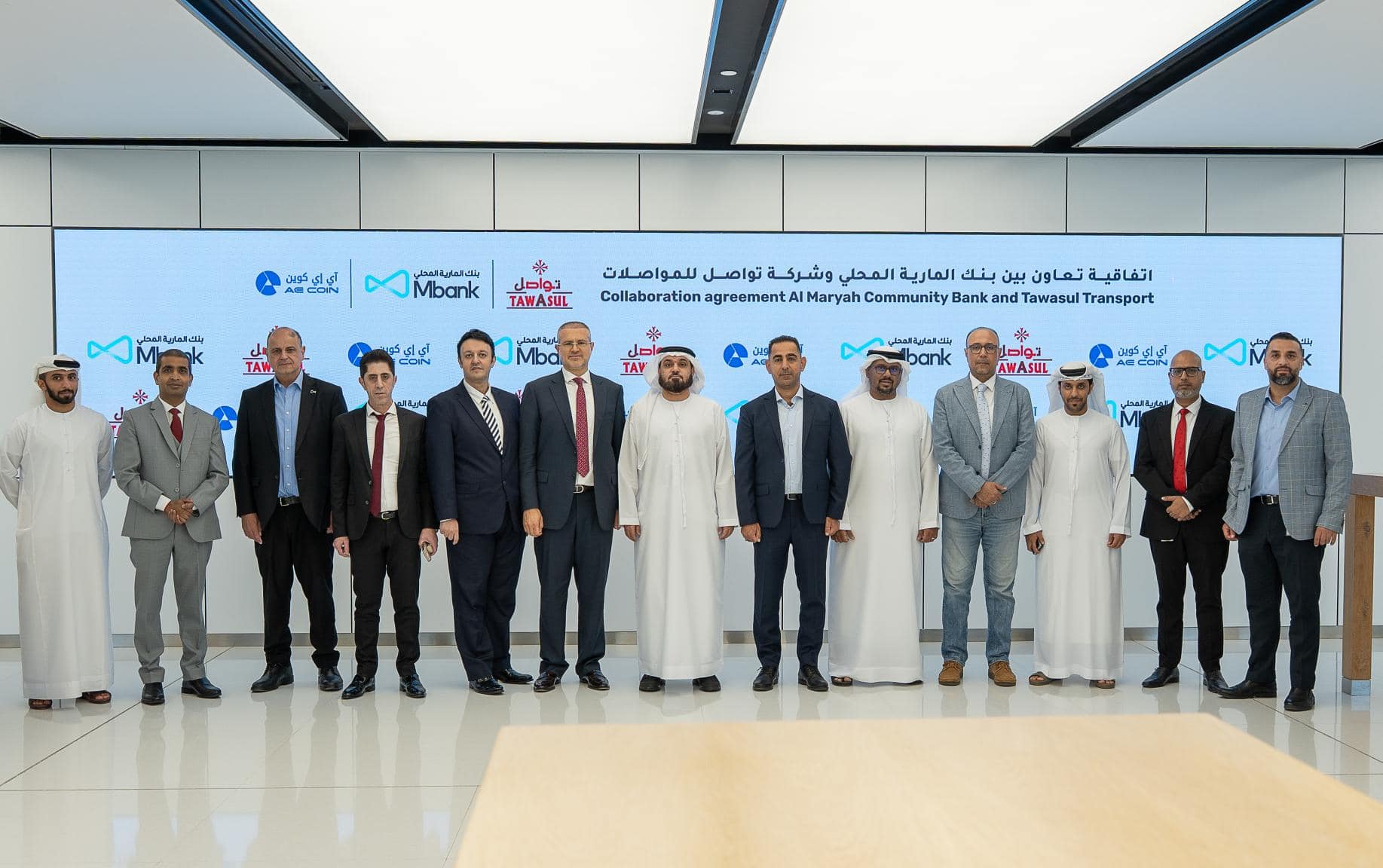 Tawasul Transport and Al Maryah Community Bank launch the first digital payment system in taxis using AE Coin
